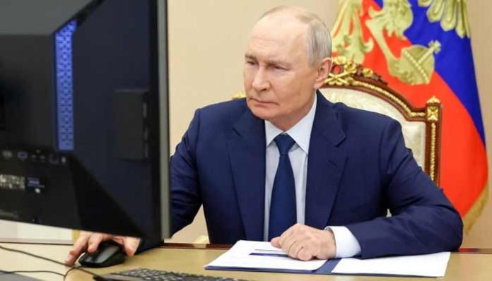 Putin’s party set to retain power after Russia vote hit by cyberattacks, drones