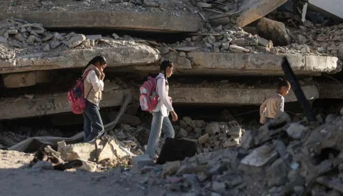 With reconstruction stalled, Gazans shelter in buildings at risk of collapse