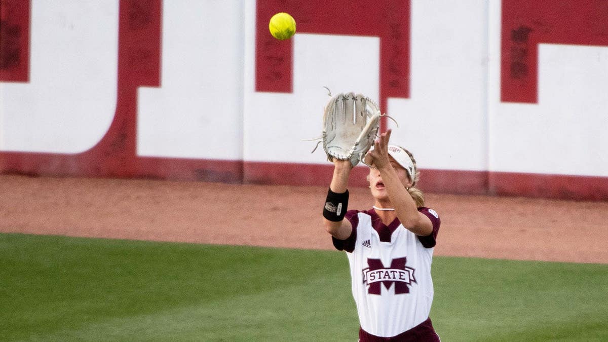 Brylie St. Clair catches a fly ball against Alabama at Rhoads Stadium.