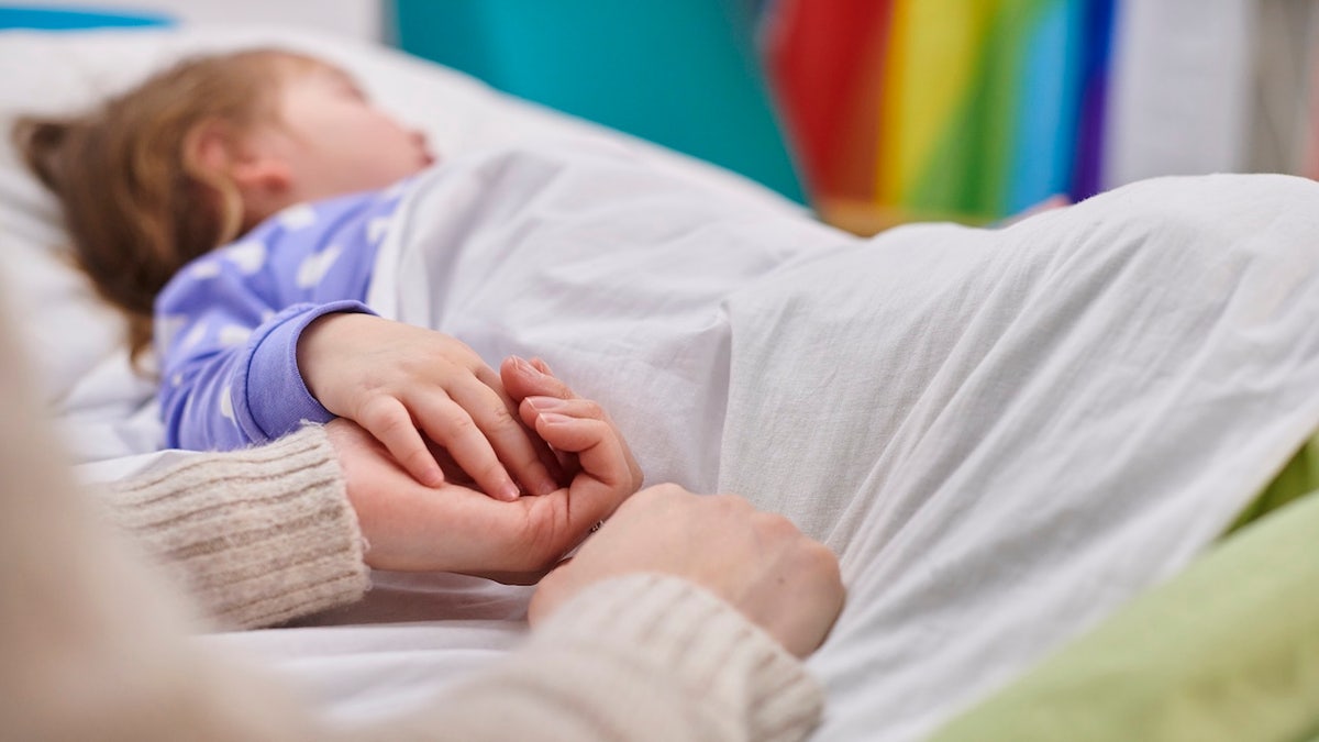 Sick child with parent