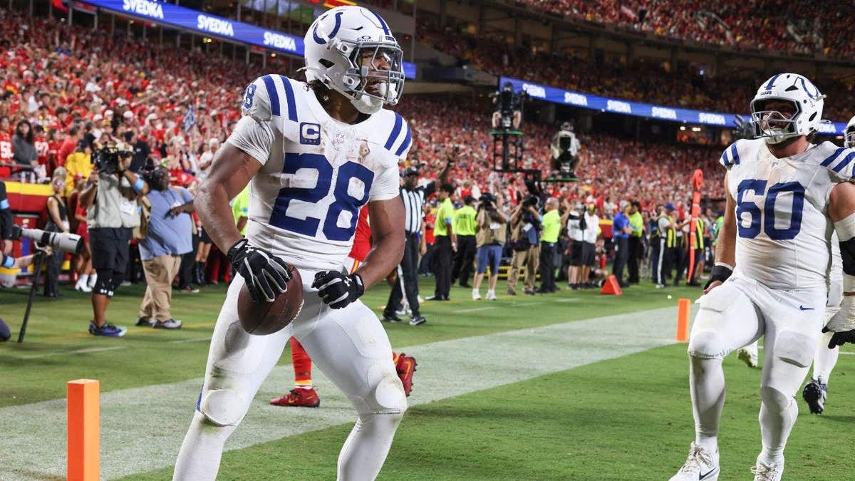 Jonathan Taylor of the Indianapolis Colts runs after a 24-yard touchdown at Arrowhead Stadium.