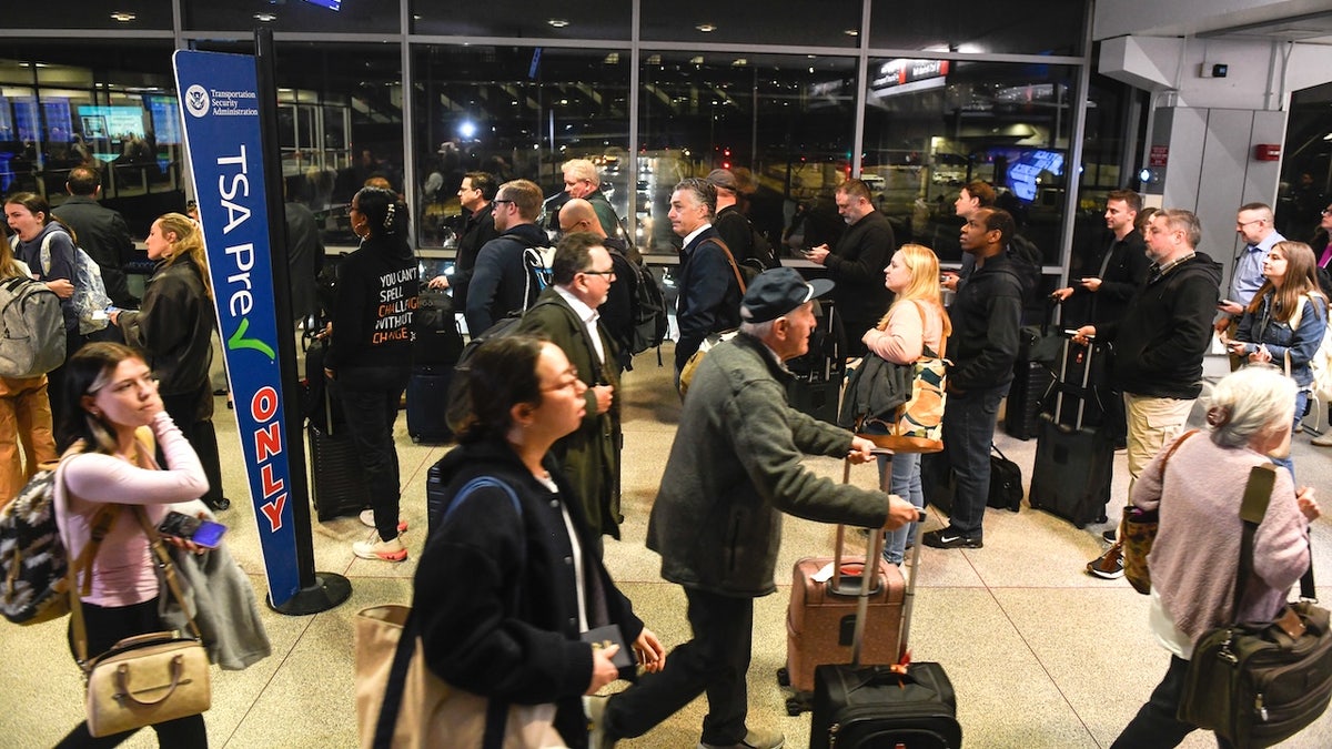 Travelers at Philadelphia Intl Airport