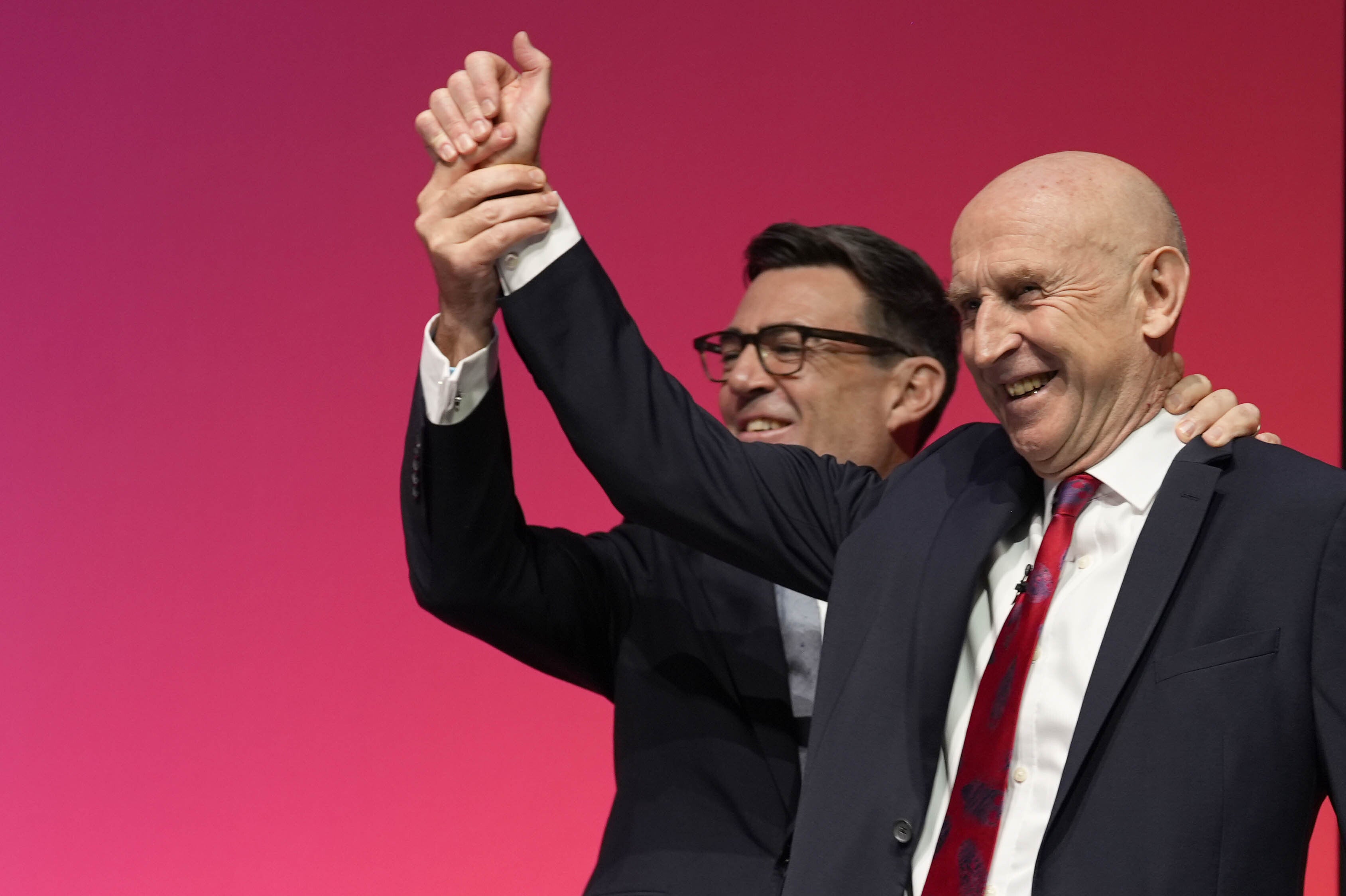 Andy Burnham with Chancellor John Healey during the Labour Party conference in Liverpool (Peter Byrne/PA)