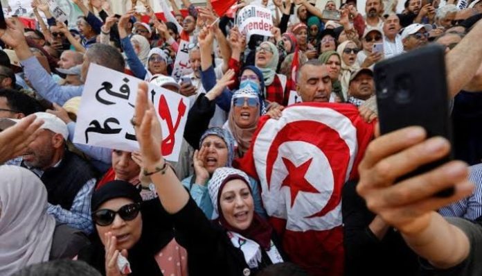 Arab Spring slogans return to Tunisia as thousands demand president’s removal