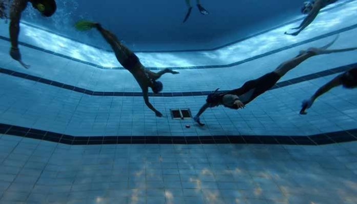 ‘Physical hell’: Hong Kong hosts gruelling underwater hockey tournament