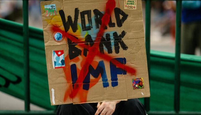 ‘Two bad options’: Rights groups decry IMF austerity demand
