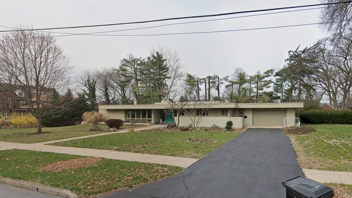 image shows photo of family home