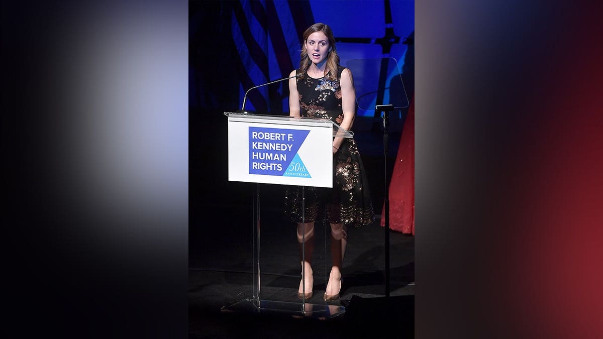 Kyle Kennedy Kerr speaks onstage during an awards event.